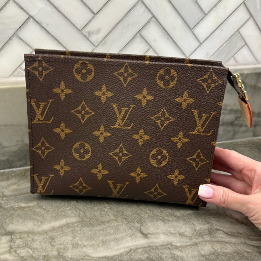 Louis Vuitton Toiletry 19 NEW with red interior